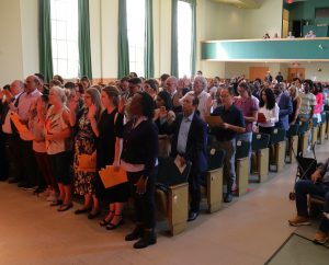 The 101 new citizens take their oath.