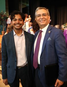 Michael Fernando, left, a Tusculum alumnus, takes a photo with Dr. Scott Hummel, Tusculum’s president, after the ceremony.