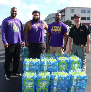 Left to right, Steve Anderson, Xavier Velazquez, Chuck Sutton and Shane Matthews assisted with water distribution at Greeneville Municipal Airport.