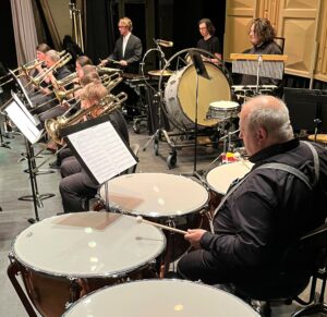 The percussion and trombone sections perform during the Tusculum University Community Band concert in February.