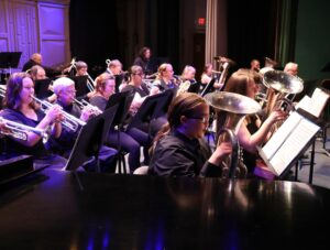 The Tusculum University Community Band practices before its performance in February.