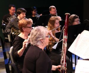 The Tusculum University Community Band practices before its performance in February.