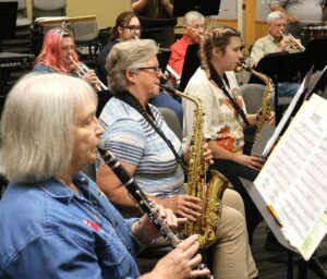 Members of the Tusculum University Community Band rehearse for their upcoming concert.