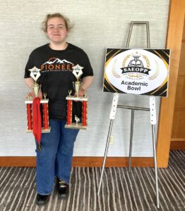 Julia Richmond holds her award for being the top individual scorer at the conclusion of the Southeastern Association of Educational Opportunity Program Personnel’s Academic Bowl in Atlanta. She is also holding the team trophy for finishing first overall.