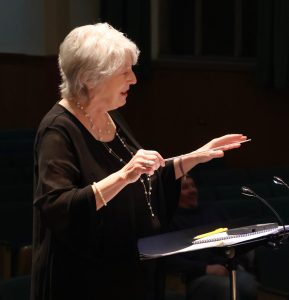 Kathy May will conduct the chorus .