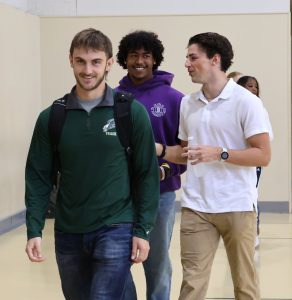 Students are in good spirits as they arrive for Opening Convocation.