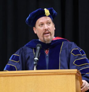 Dr. David Cook speaks during convocation.