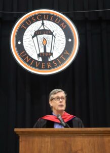 Dr. Joel Van Amberg, faculty chair, addresses the audience.