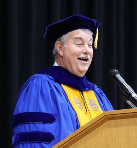 Dr. Greg Nelson speaks after receiving the honorary doctorate.