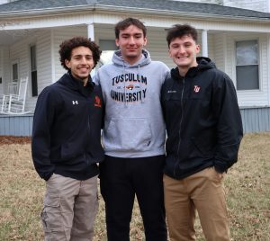 Male students in the Discipleship Living-Learning Center stand outside their house. Left to right are Nour Nabi, Josh Rowe and Rio Little.