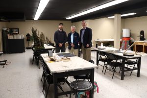 Left to right, Benjamin Conley, Clem Allison and Dr. David Cook stand in the updated 3-D sculpture laboratory.
