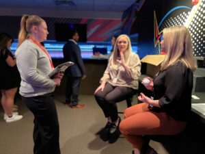 Holly Cowan, left, meets with Bristol Motor Speedway representatives.