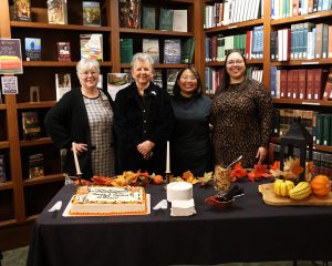 Library staff members pose for a photo. Left to right are Kathy Hipps, Marsha Griffith, Gabby Williams and Kayla Yates.