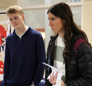 Aiden Roper, left, and Addison McLarty, visit one of the tables.