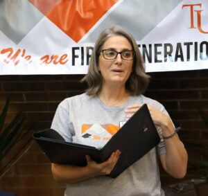 Rachael Barnett, director of Student Support Services, speaks during the event.