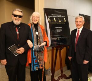Left to right, Wess duBrisk, Marilyn duBrisk and Clem Allison share a moment together at the gala.