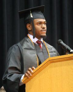 Andrae Robinson speaks during the commencement ceremony.