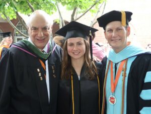 Abby Lockwood, center, celebrates her degree with Angelo Botta, left, and Dr. Suzanne Byrd.