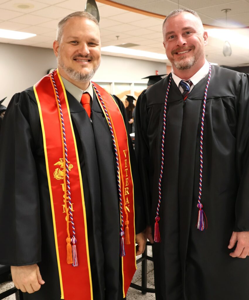 Graduates pose for a photo 12-9-23.