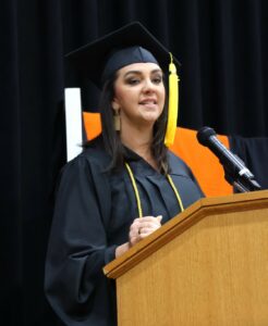 Brandy Thigpen speaks to fellow graduates and the rest of the audience.
