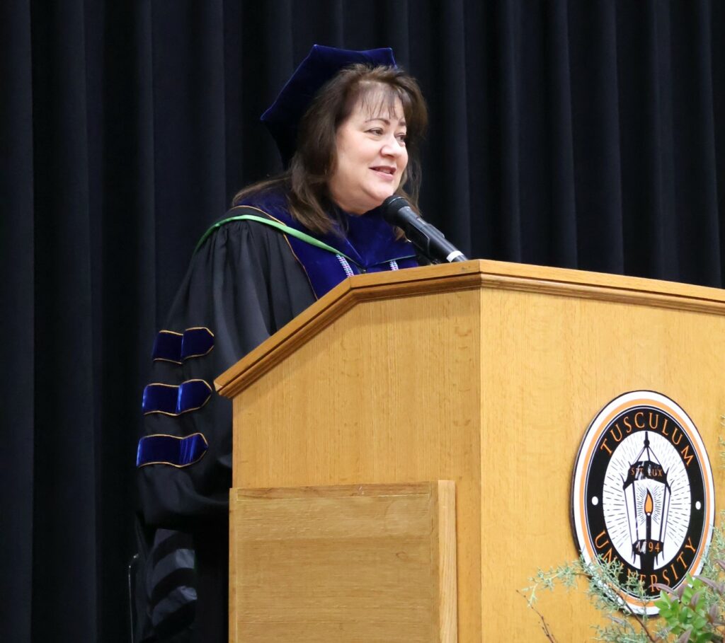 Dr. Tricia Hunsader, provost and vice president of academic affairs, makes introductory remarks at the 12-9-23 commencement ceremony.