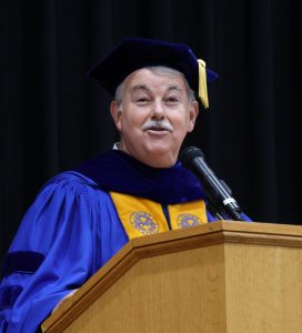 Dr. Greg Nelson speaks to the graduates.