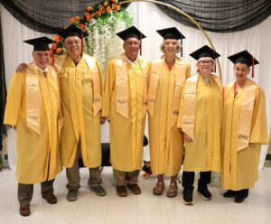 The Golden Pioneers pose for a photo. They are, left to right, Angelo Botta, Larry Bible, John Eiskamp, Jane Campbell, Sharon King and Jackie Rose.