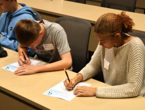 Two students work on an activity.