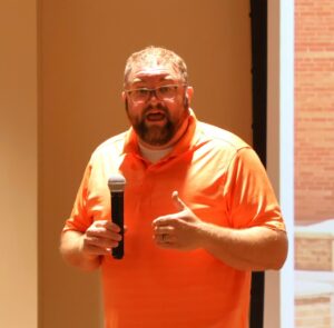 Clay Wilkerson speaks with the students.