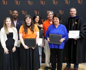 Four people earned Outstanding Service to Students Awards. They were Meagan Stark, second from left; Jackie McCrary, fifth from left, Jackie McCrary, sixth from left, and Dr. Kurtis Miller, right. Student Maria Torres, fourth from the left, received the School Spirit Award. Joining them for the photo are BriAnna Higgins, left, with the Student Government Association and Chuck Sutton, second from left, with the Office of Student Affairs.