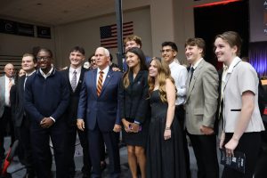 Students who reside in the Discipleship Living-Learning Center pose with Mike Pence.