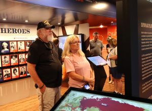 A couple look at an exhibit.