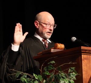 U.S. District Court Judge Clifton Corker administers the oath to the new citizens.