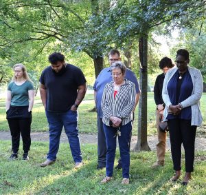 Representatives of the Office of Admission participate in a moment of silence at the start of the event.