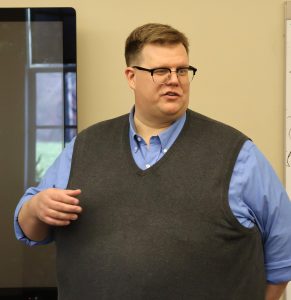 Zack Kassebaum speaks at the open house.