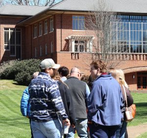 Some of the attendees took the campus tour and approach the Thomas J. Garland Library.