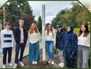This is the peace pole at Linfield University in Oregon (photo from rotarypeacepoles.world)
