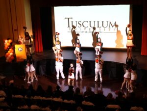 The Tusculum cheerleading team performs a routine during the premiere.
