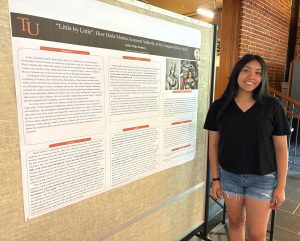 Sofia Mejia Ramirez shows her poster.