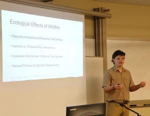 Caleb Swinehart presents his subject.