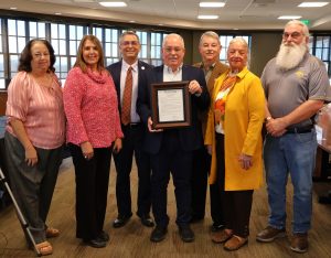 Members of USS Greeneville Inc. and representatives of Tusculum pose for a photo afterward. They are, left to right, Vera Ann Myers, Patricia Bohon, Dr. Scott Hummel, Dale Long, Dr. Greg Nelson, Jann Mirkov and Bob Rediske.