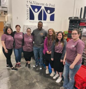 Tusculum Bonner leaders and staff members of the Center for Civic Advancement gather at the Society of St. Vincent de Paul. Left to right are Josie Norton, Janelle Zirger, Amanda Delbridge, Anthony Bennett, Isabelle Delbridge, Maggie Vickers and Amanda Lunceford.
