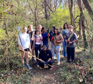 Upward Bound and Upward Bound Math and Science students pose on the trail.