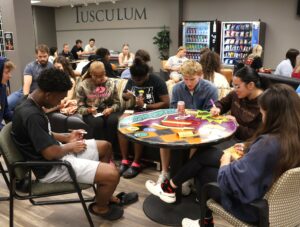 Students play bingo during a Homecoming event.