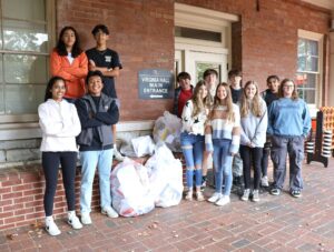 These students show the items they collected from Virginia Hall.