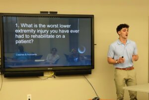 Student Connor Jordan gives his presentation during Academic Symposium.