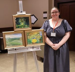 Sophia Derrick shows her artwork.