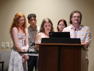 Students make a history presentation. They are, left to right, Thelma Clapp, Jayden Thomas, AnnaLee Simpson, Lily Burgner and Chris Colmer.