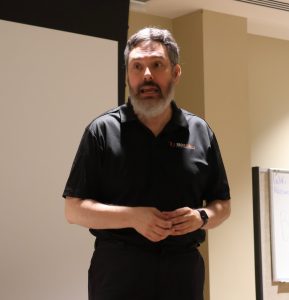 Dr. Chuck Pearson addresses the competitors.