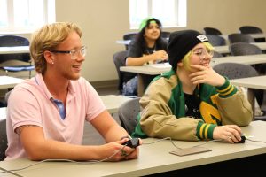 Two competitors enjoy a lighthearted moment during a game.